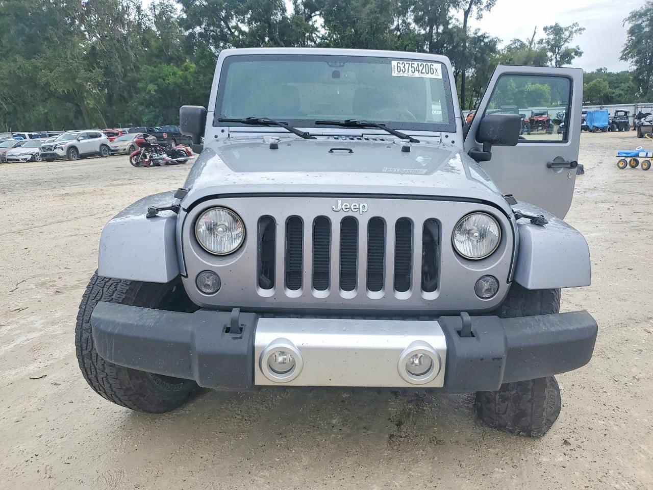 2015 Jeep Wrangler Unlimited Sahara - Фото 5