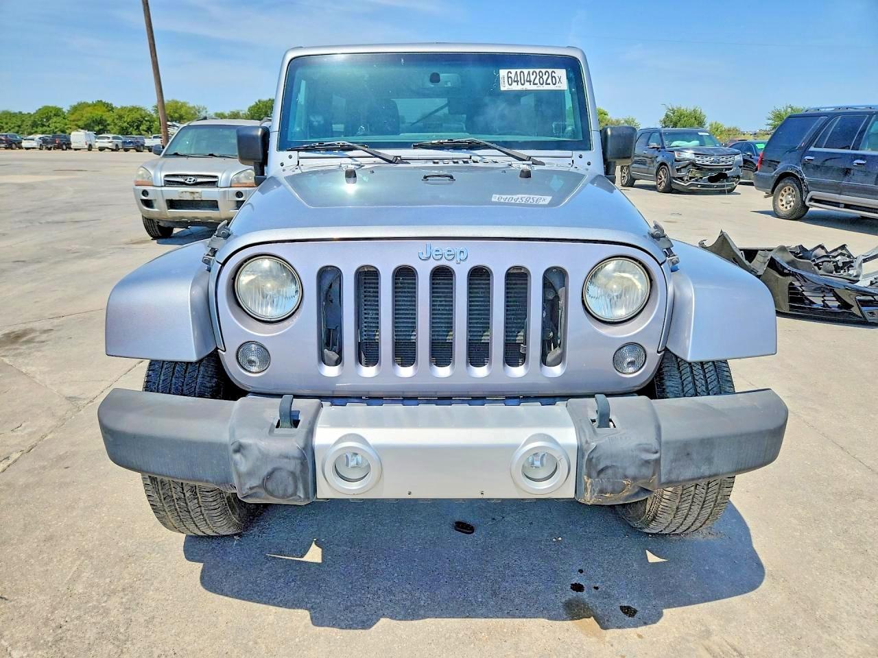 2014 Jeep Wrangler Unlimited Sahara - Фото 5