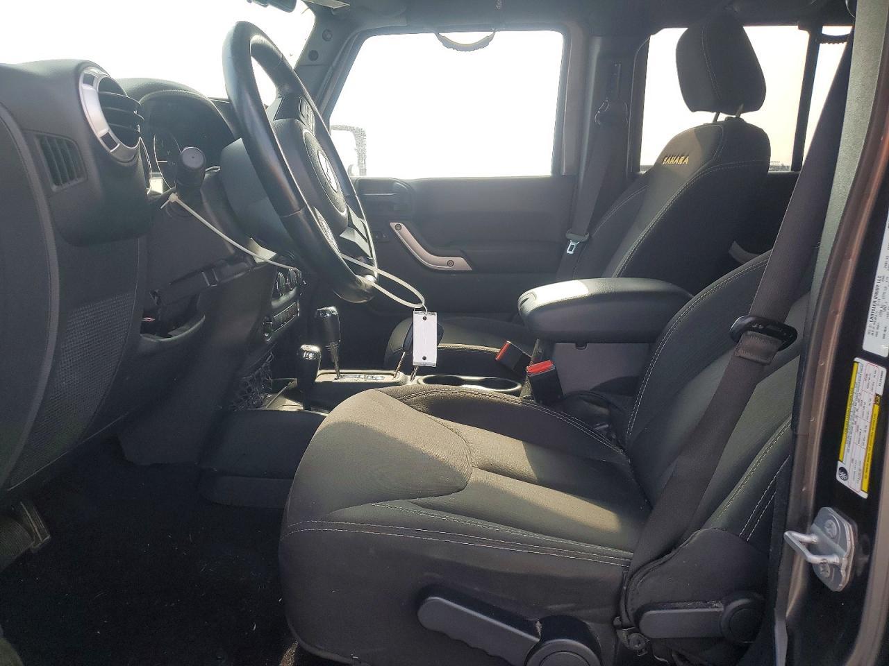 2014 Jeep Wrangler Unlimited Sahara - Фото 7
