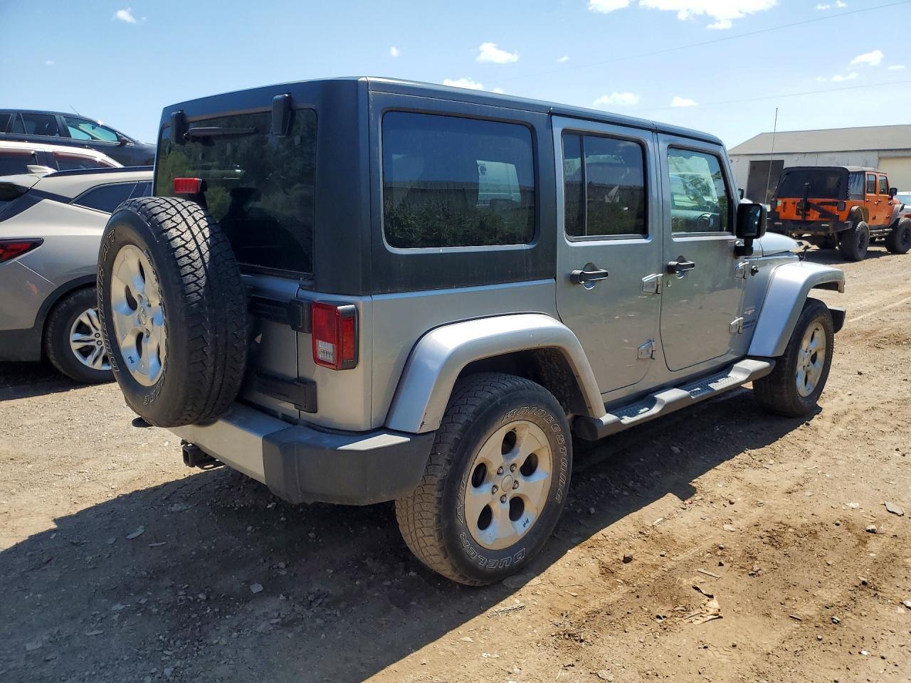 2013 Jeep Wrangler Unlimited Sahara - Фото 3