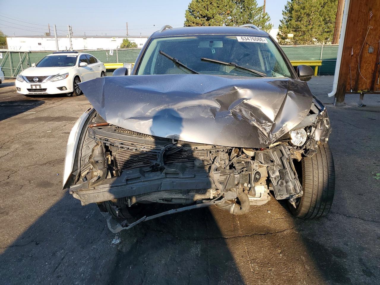 2012 Volkswagen Tiguan S - Фото 5