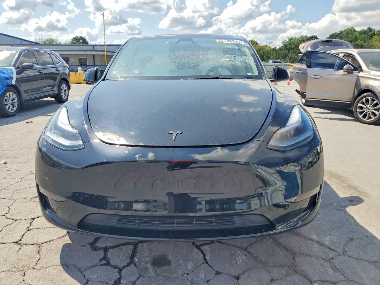 2024 Tesla Model Y - Фото 5