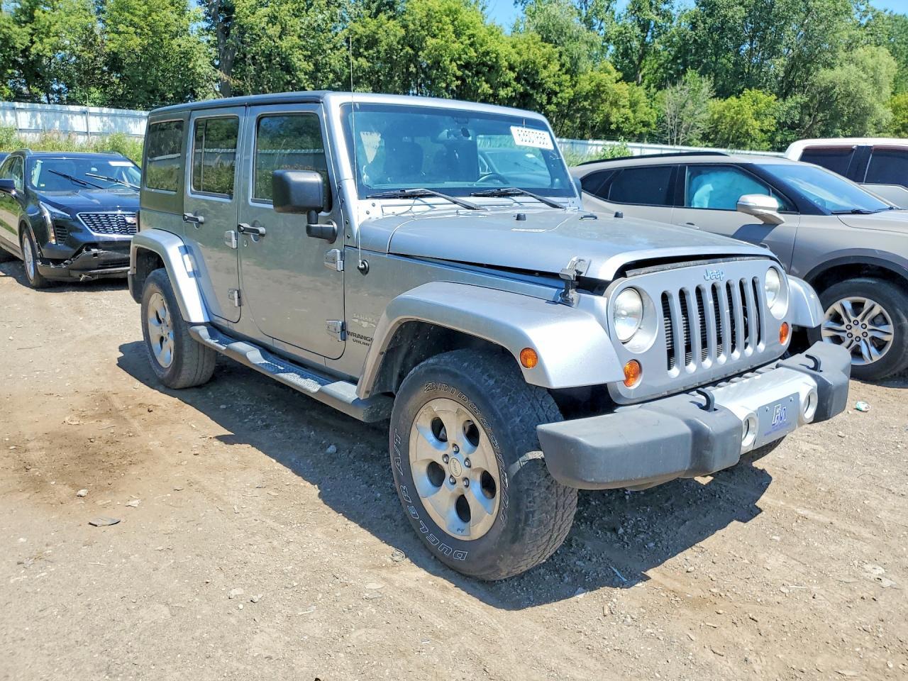 2013 Jeep Wrangler Unlimited Sahara - Фото 4