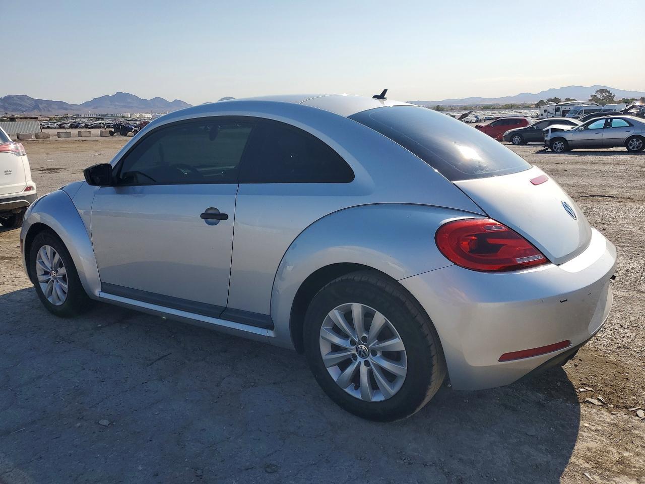 2014 Volkswagen Beetle - Фото 2