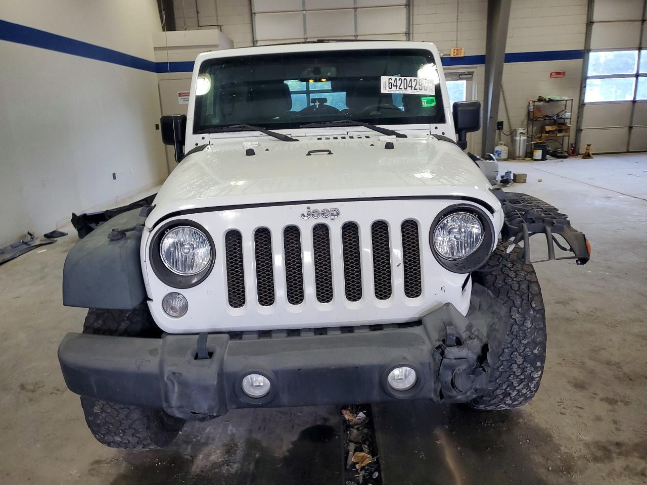 2014 Jeep Wrangler Unlimited Rubicon - Фото 5