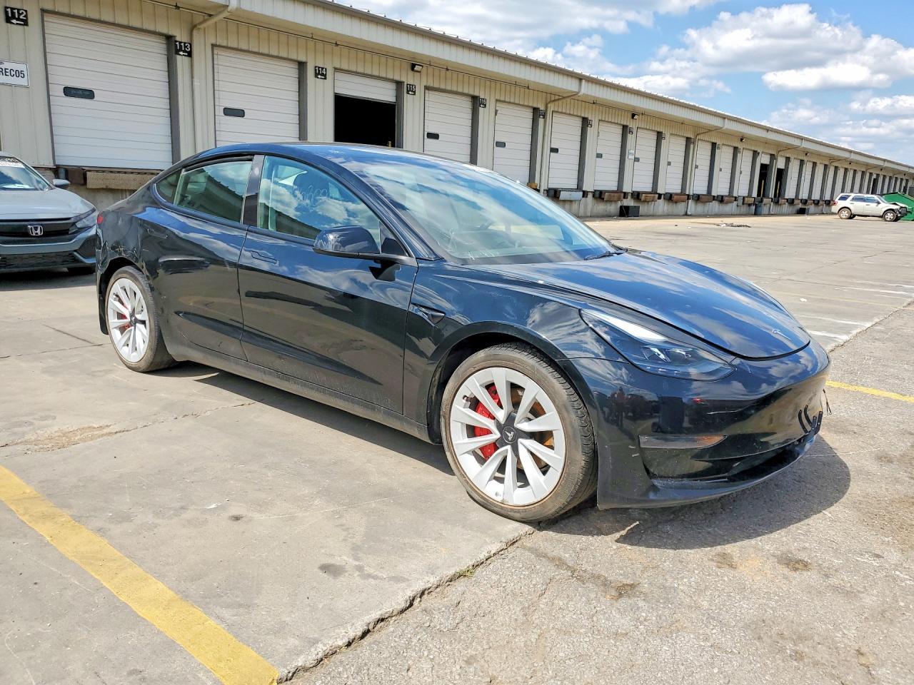 2023 Tesla Model 3 - Фото 4