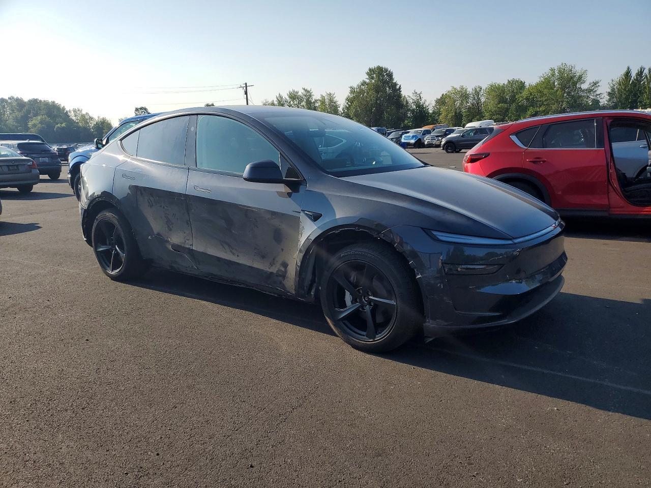 2026 Tesla Model Y - Фото 4