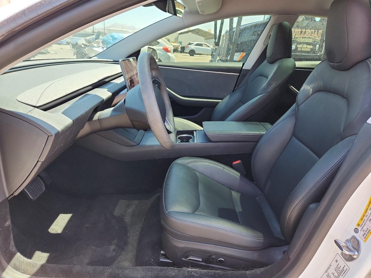 2025 Tesla Model 3 - Фото 7