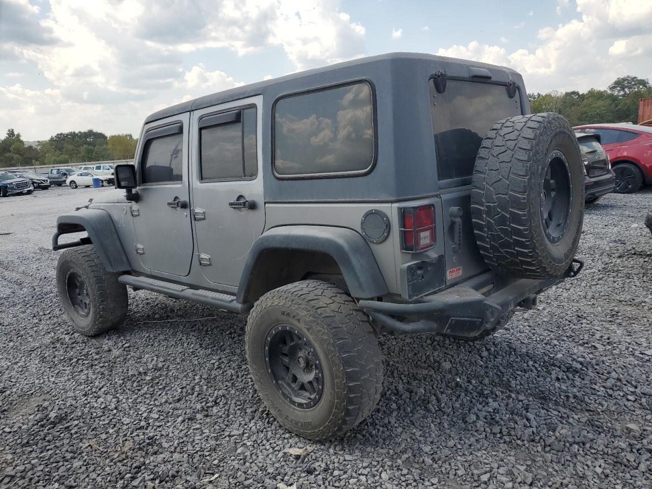 2013 Jeep Wrangler Unlimited Sport - Фото 2