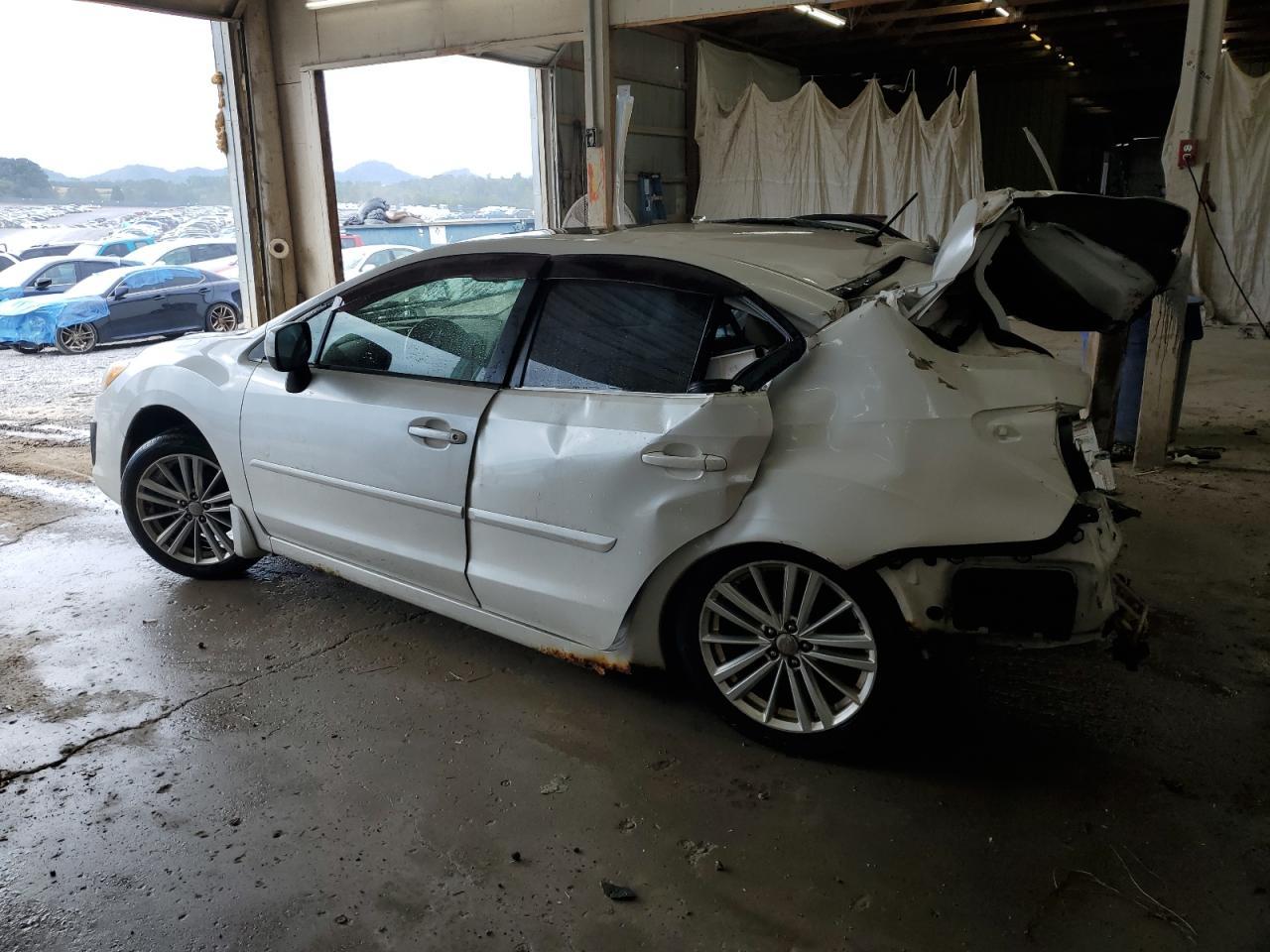 2012 Subaru Impreza Premium - Фото 2