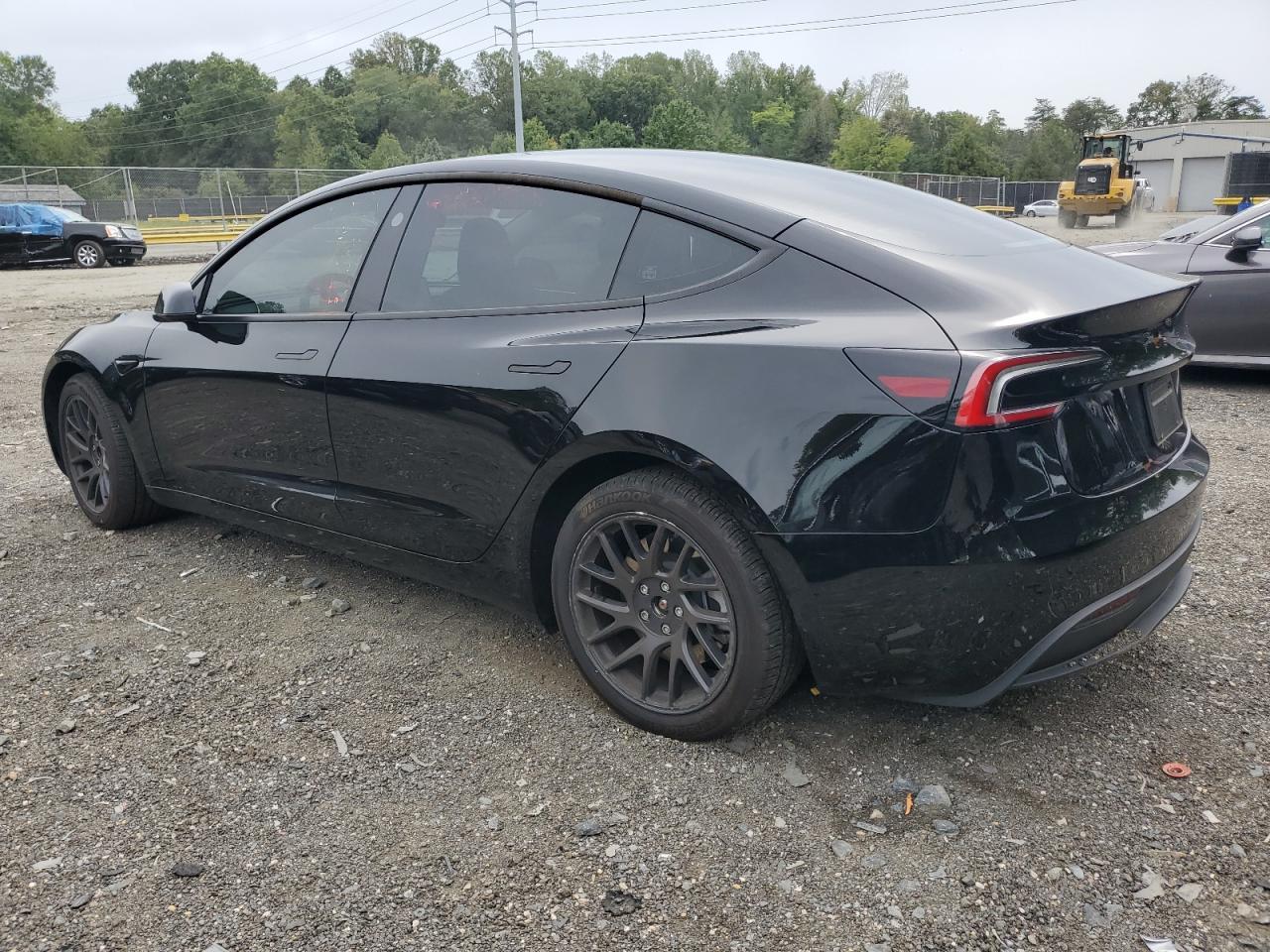 2024 Tesla Model 3 - Фото 2