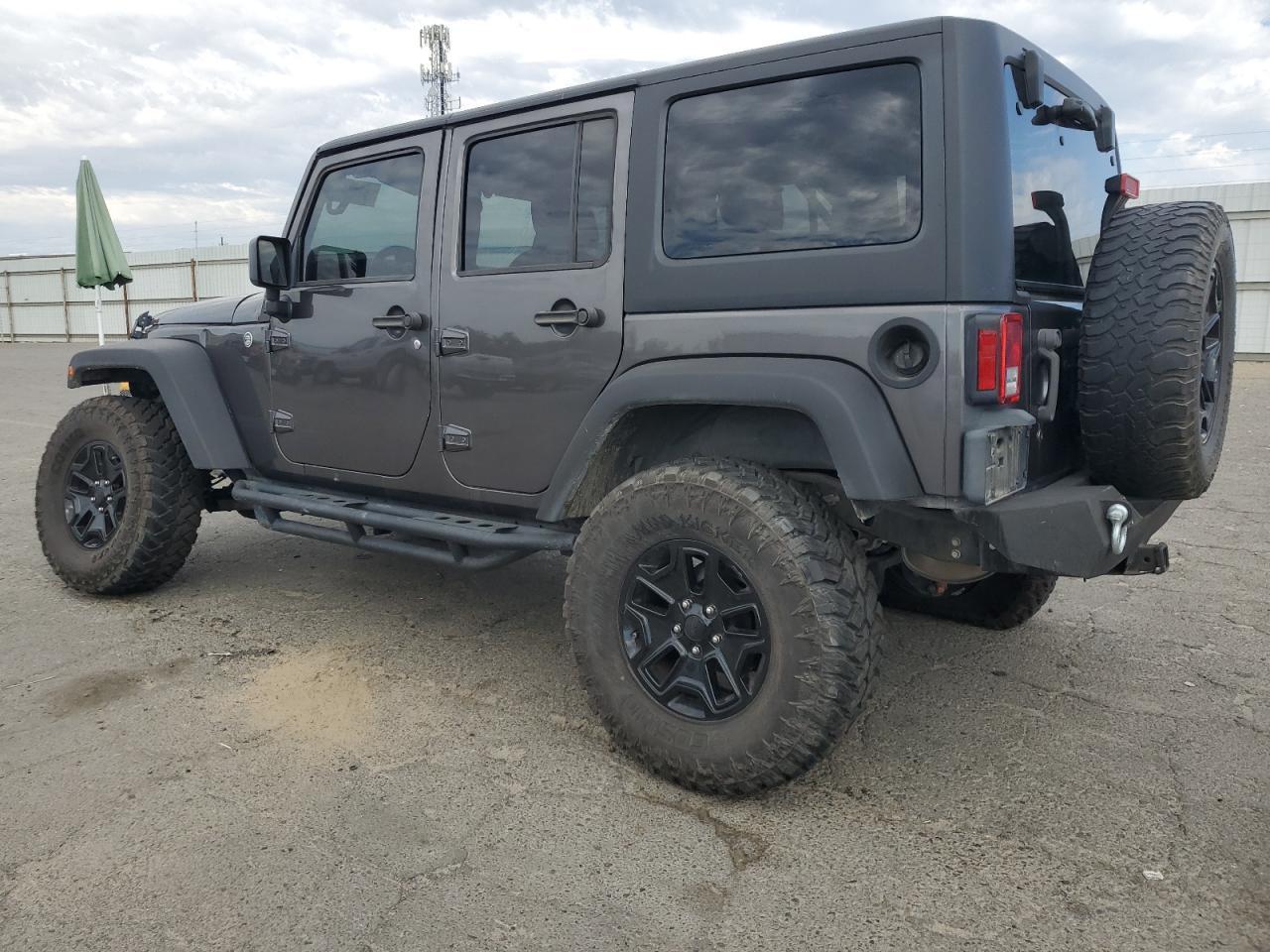 2014 Jeep Wrangler Unlimited Sport - Image 2