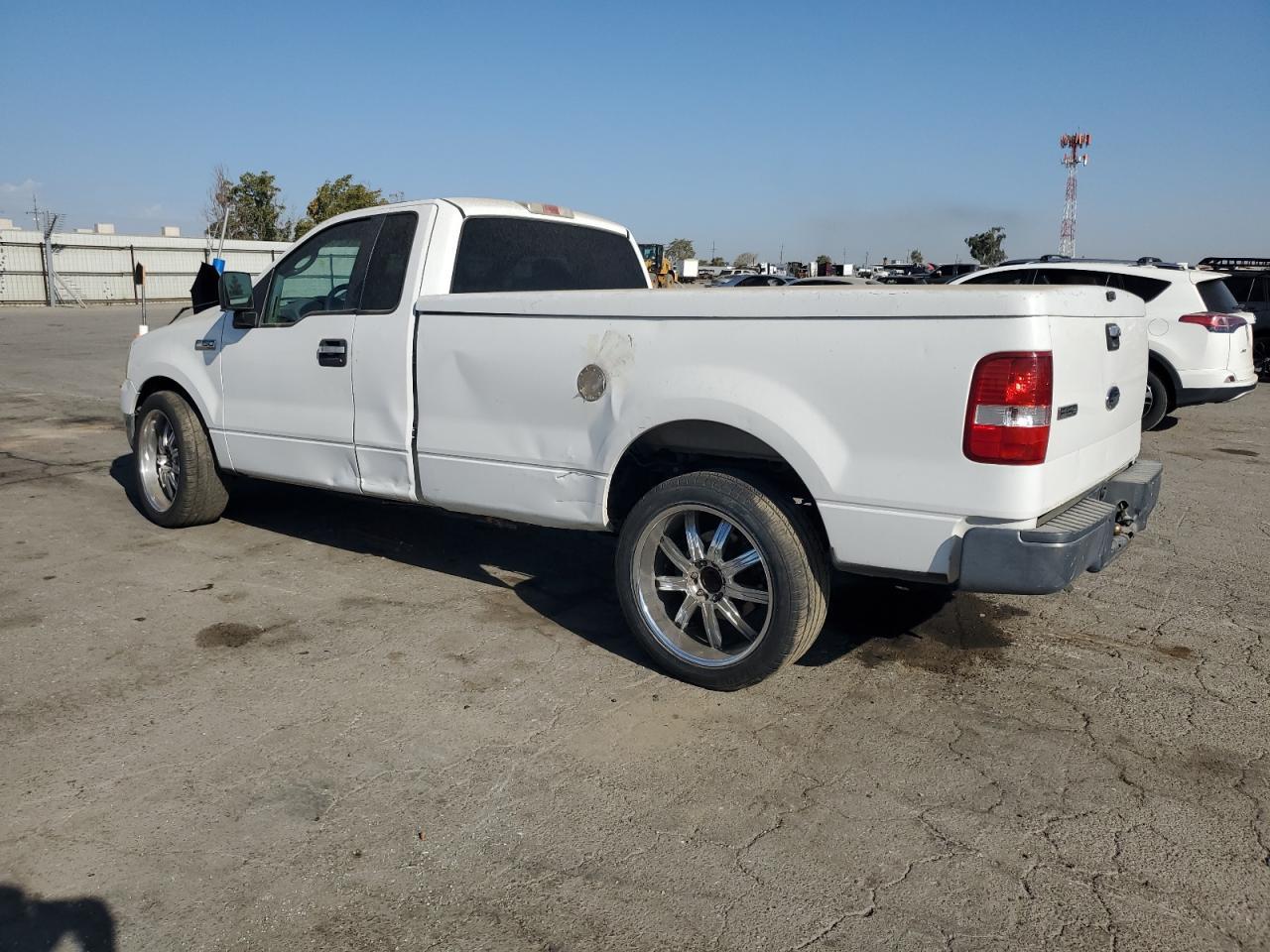 2005 Ford F150 - Фото 2