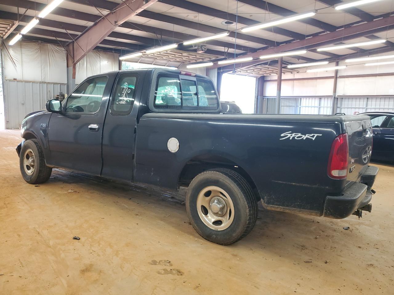 2001 Ford F150 - Фото 2