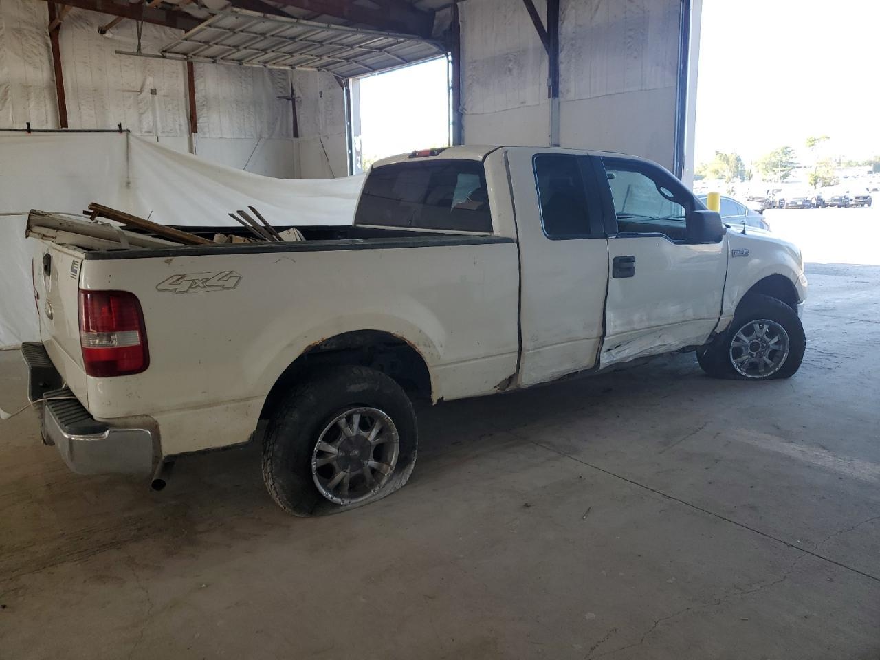 2005 Ford F150 - Фото 3