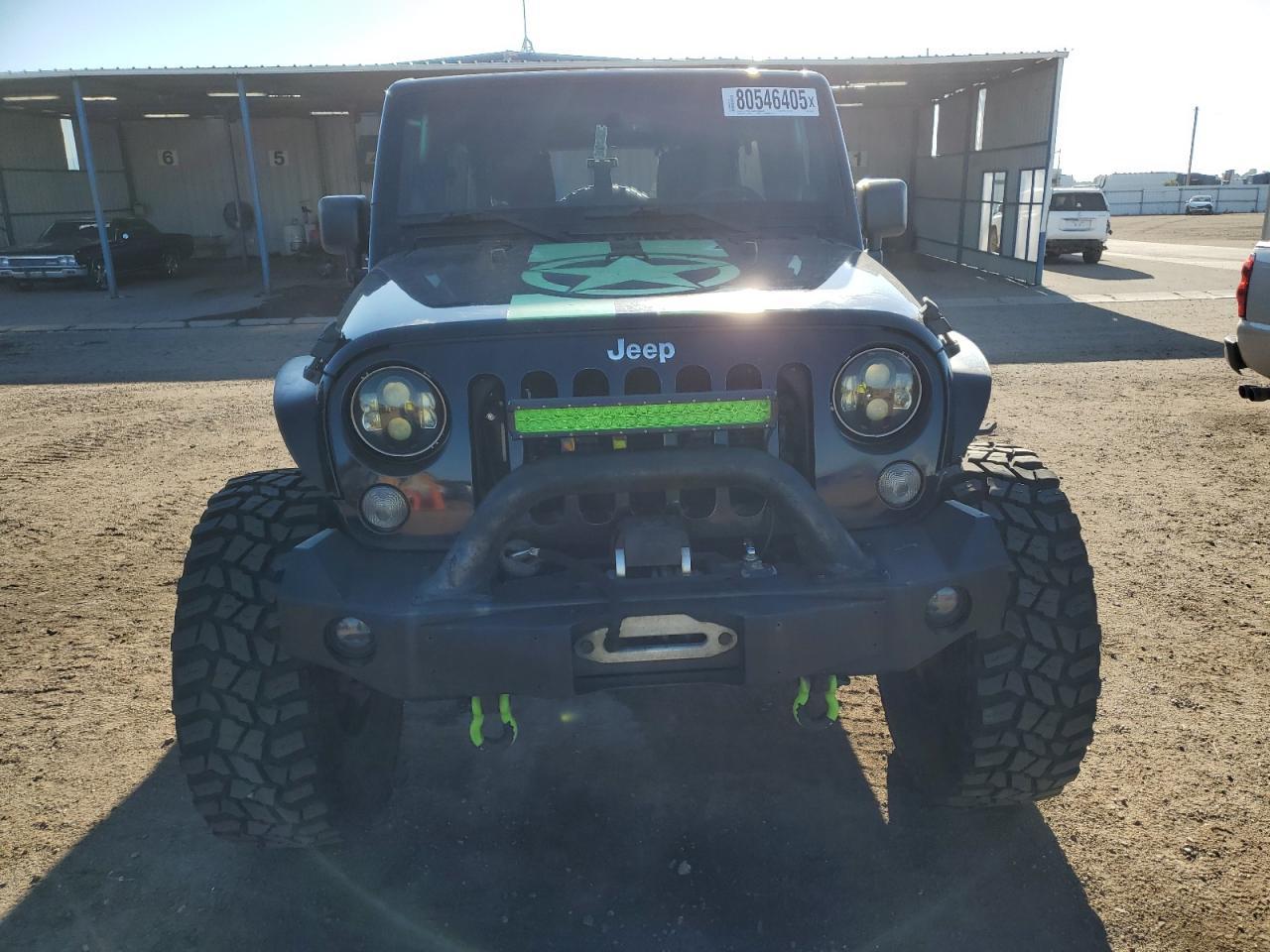 2014 Jeep Wrangler Unlimited Sahara - Фото 5