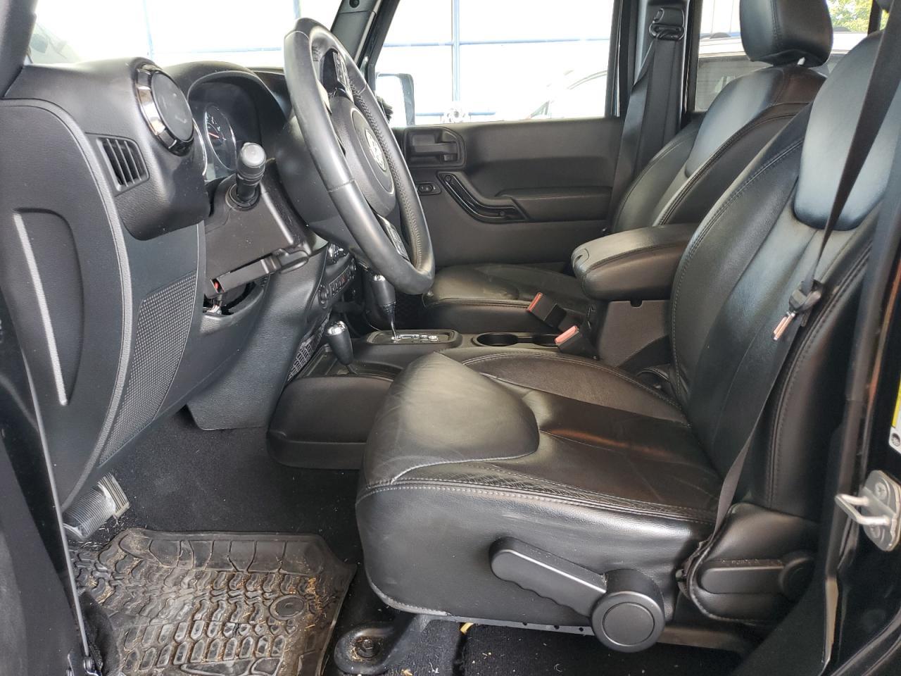 2014 Jeep Wrangler Unlimited Sahara - Фото 7