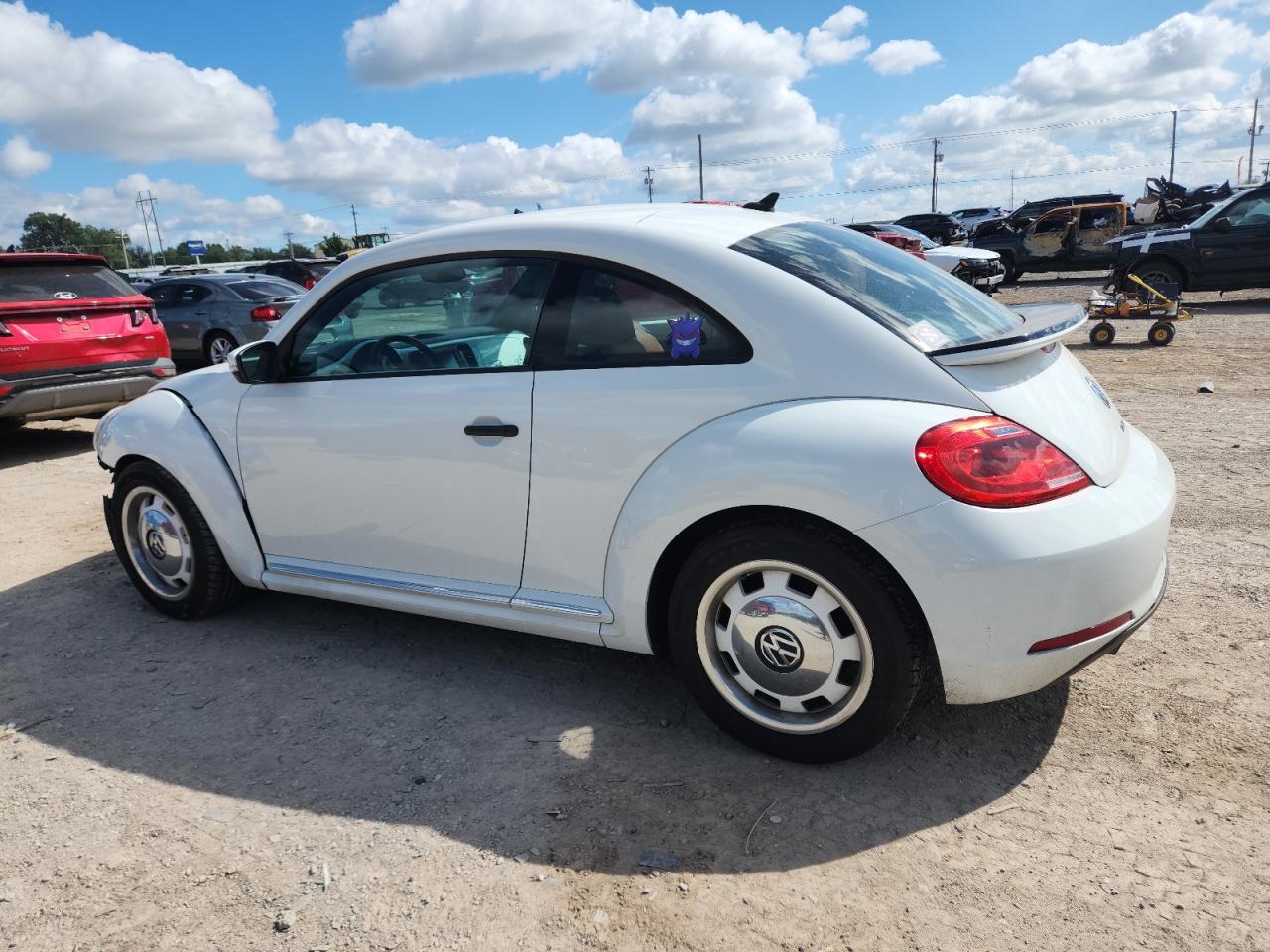 2016 Volkswagen Beetle 1.8T - Фото 2