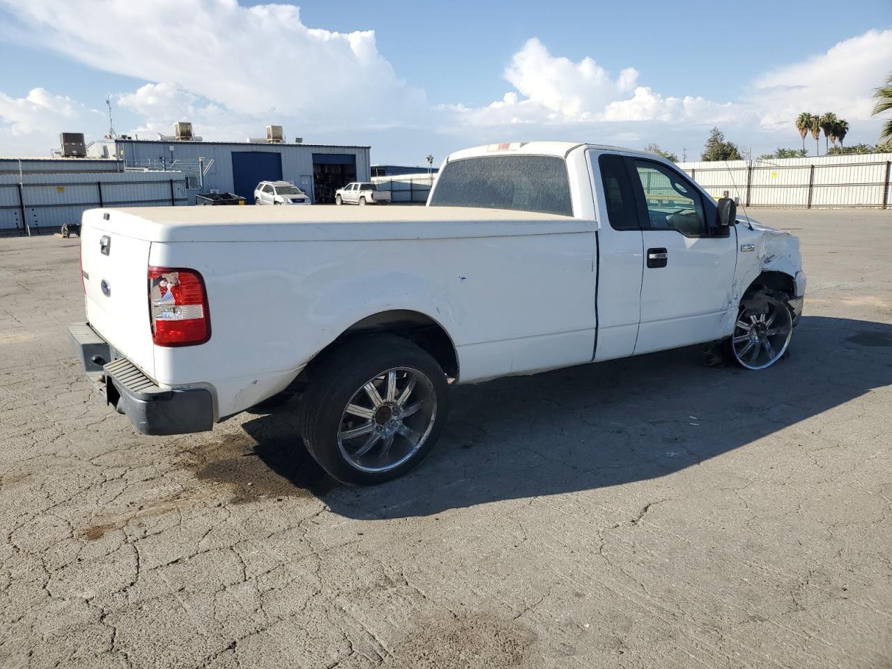 2005 Ford F150 - Фото 3