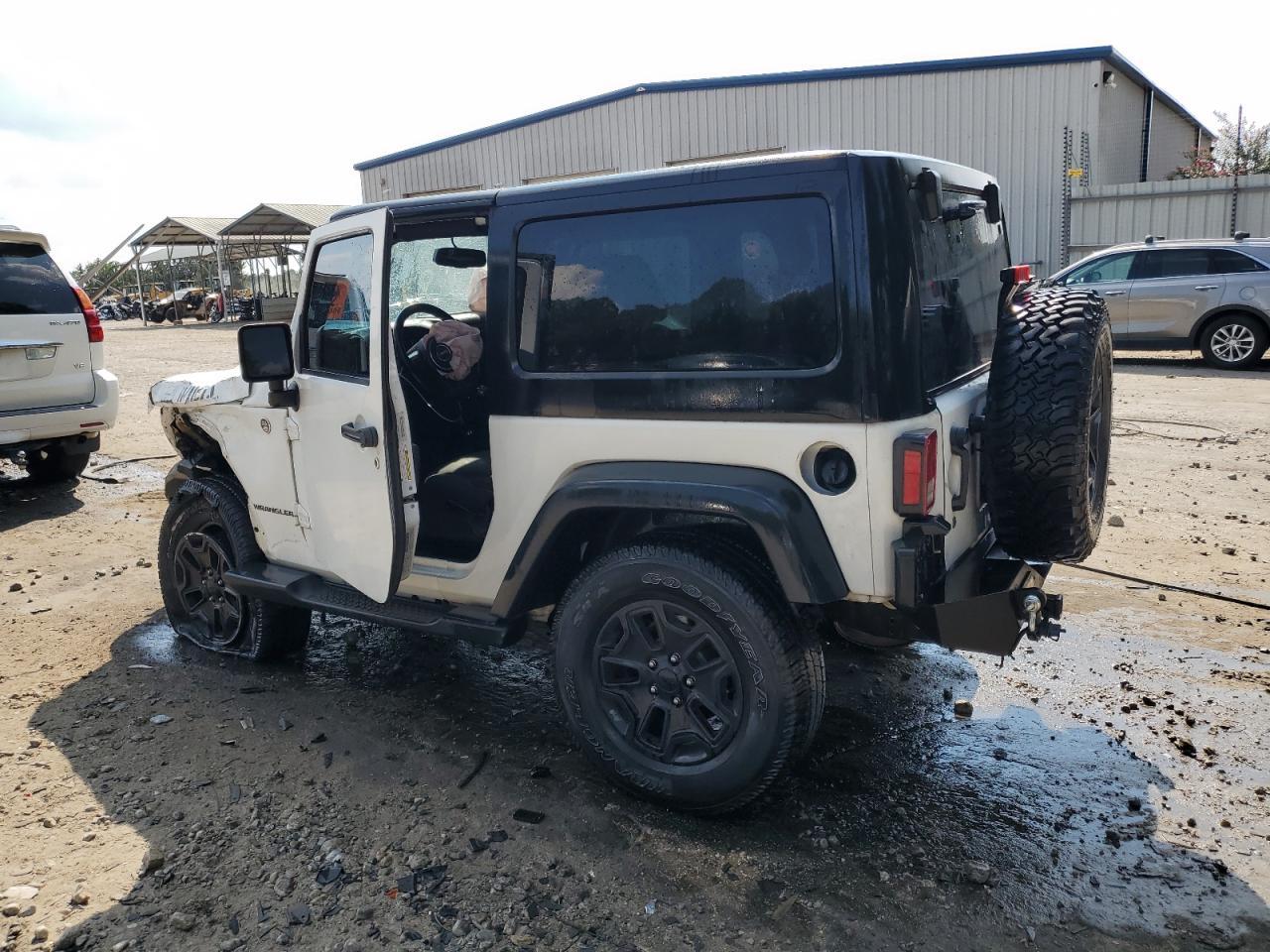2015 Jeep Wrangler Sport - Фото 2