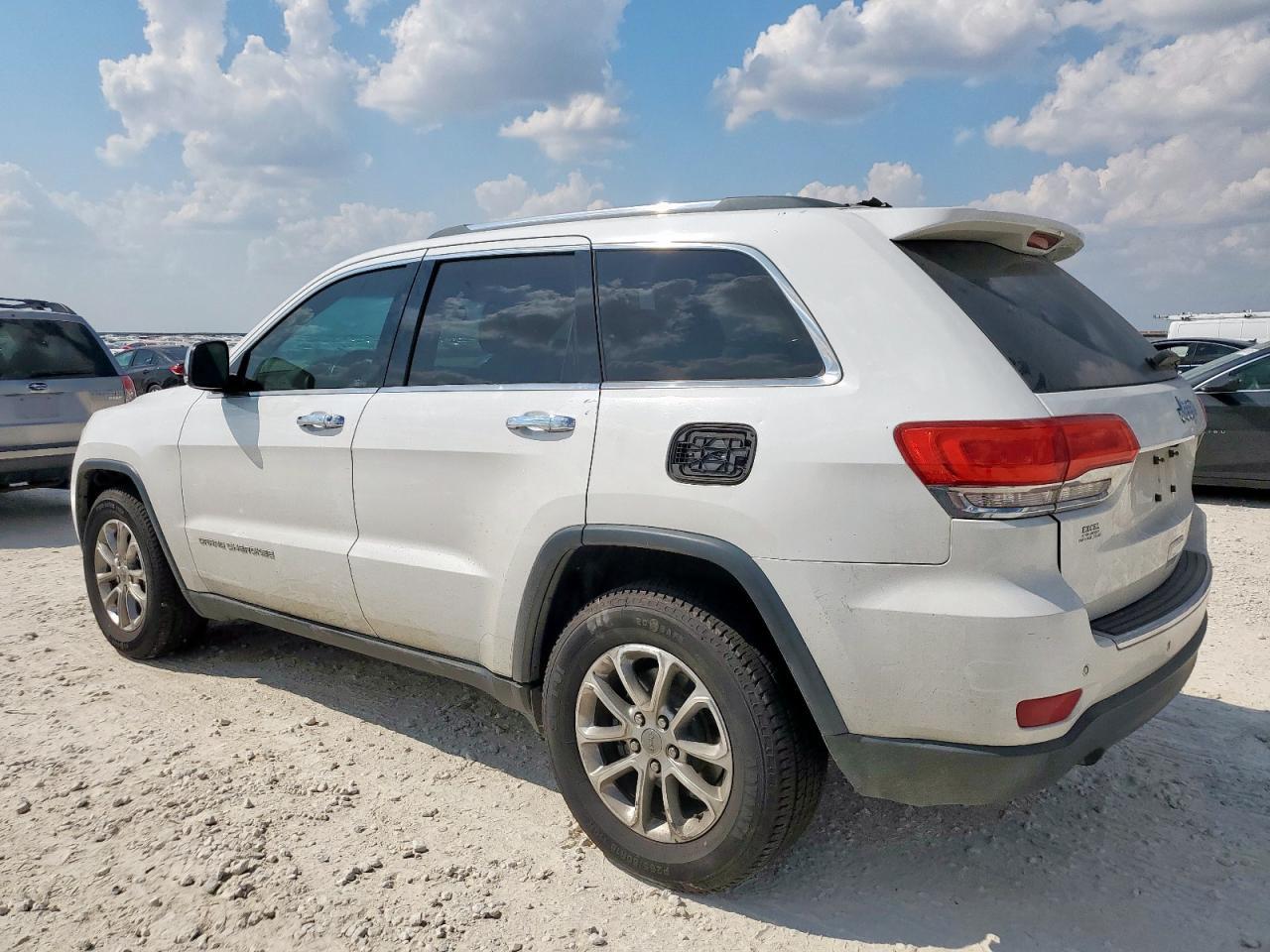 2014 Jeep Grand Cherokee - Фото 2