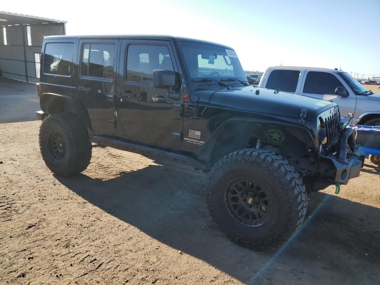 2014 Jeep Wrangler Unlimited Sahara - Фото 4