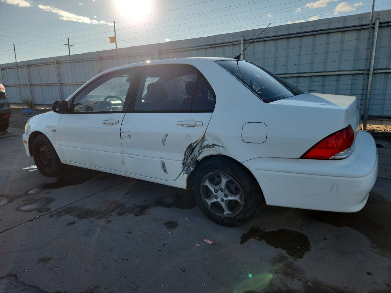 2002 Mitsubishi Lancer Es - Фото 2