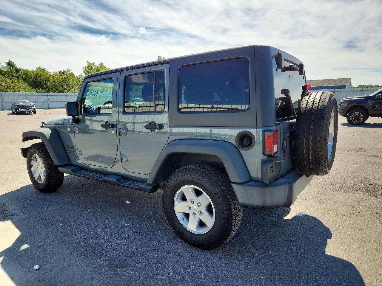 2014 Jeep Wrangler Unlimited Sport - Image 2