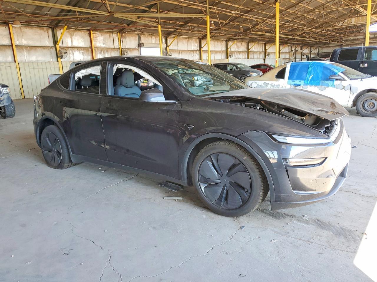 2026 Tesla Model Y - Фото 4
