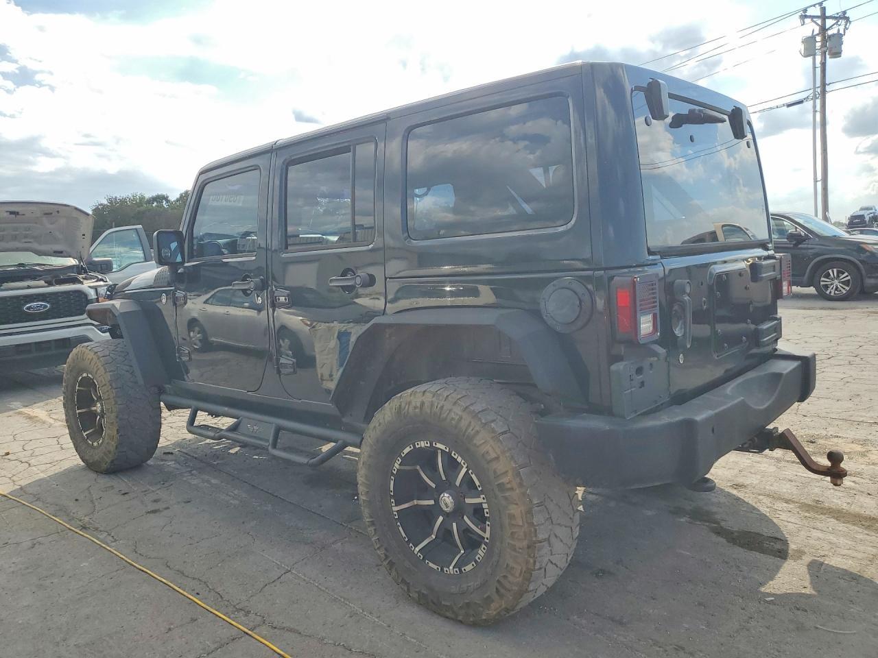 2011 Jeep Wrangler Unlimited Sport - Фото 2