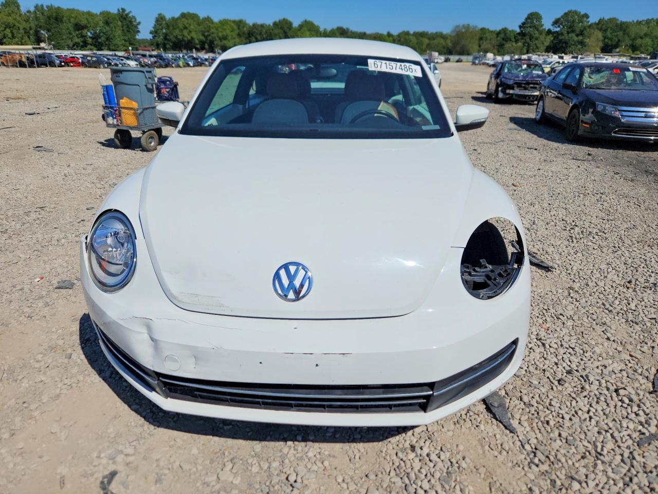 2016 Volkswagen Beetle 1.8T - Фото 5