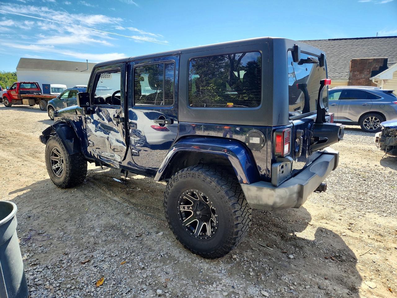 2013 Jeep Wrangler Unlimited Sahara - Фото 2