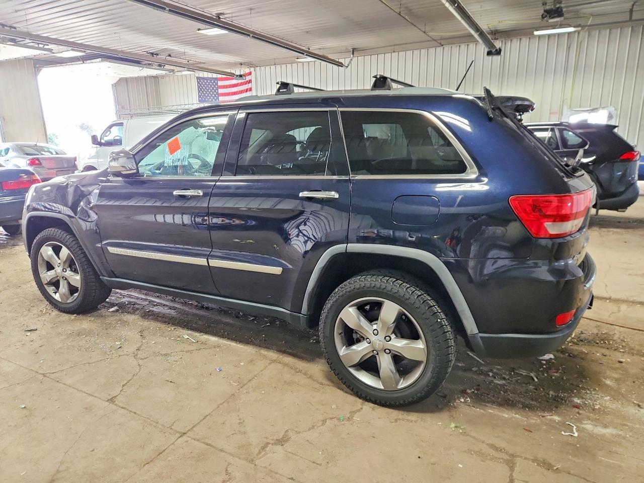 2011 Jeep Grand Cherokee Overland - Фото 2