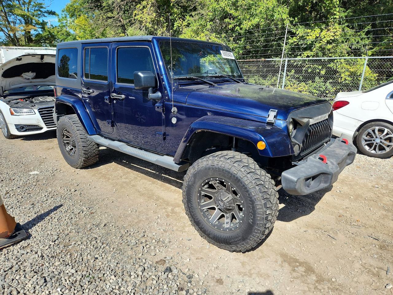 2013 Jeep Wrangler Unlimited Sahara - Фото 4