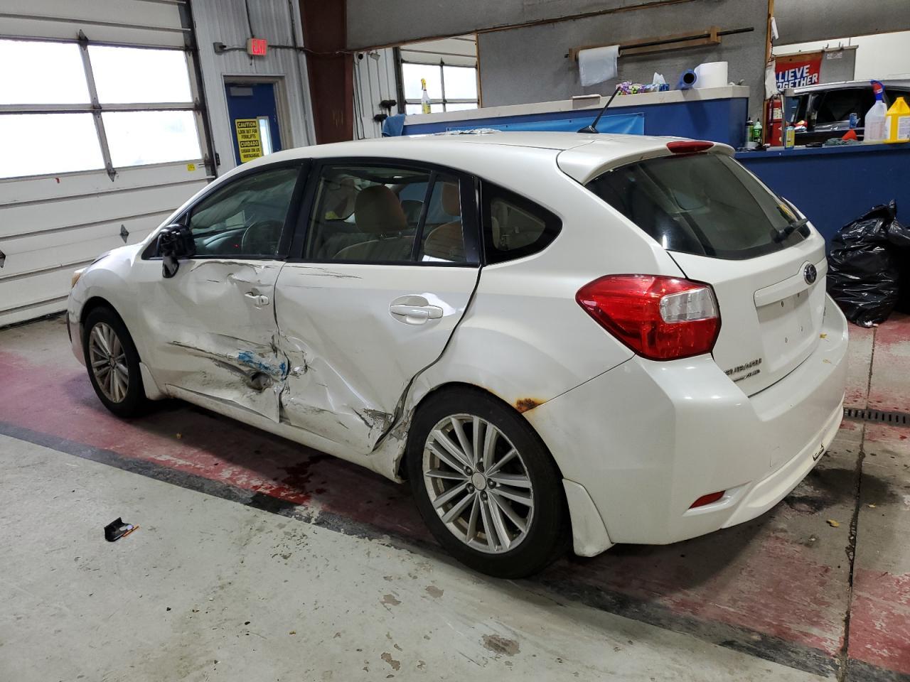 2014 Subaru Impreza Premium - Фото 2