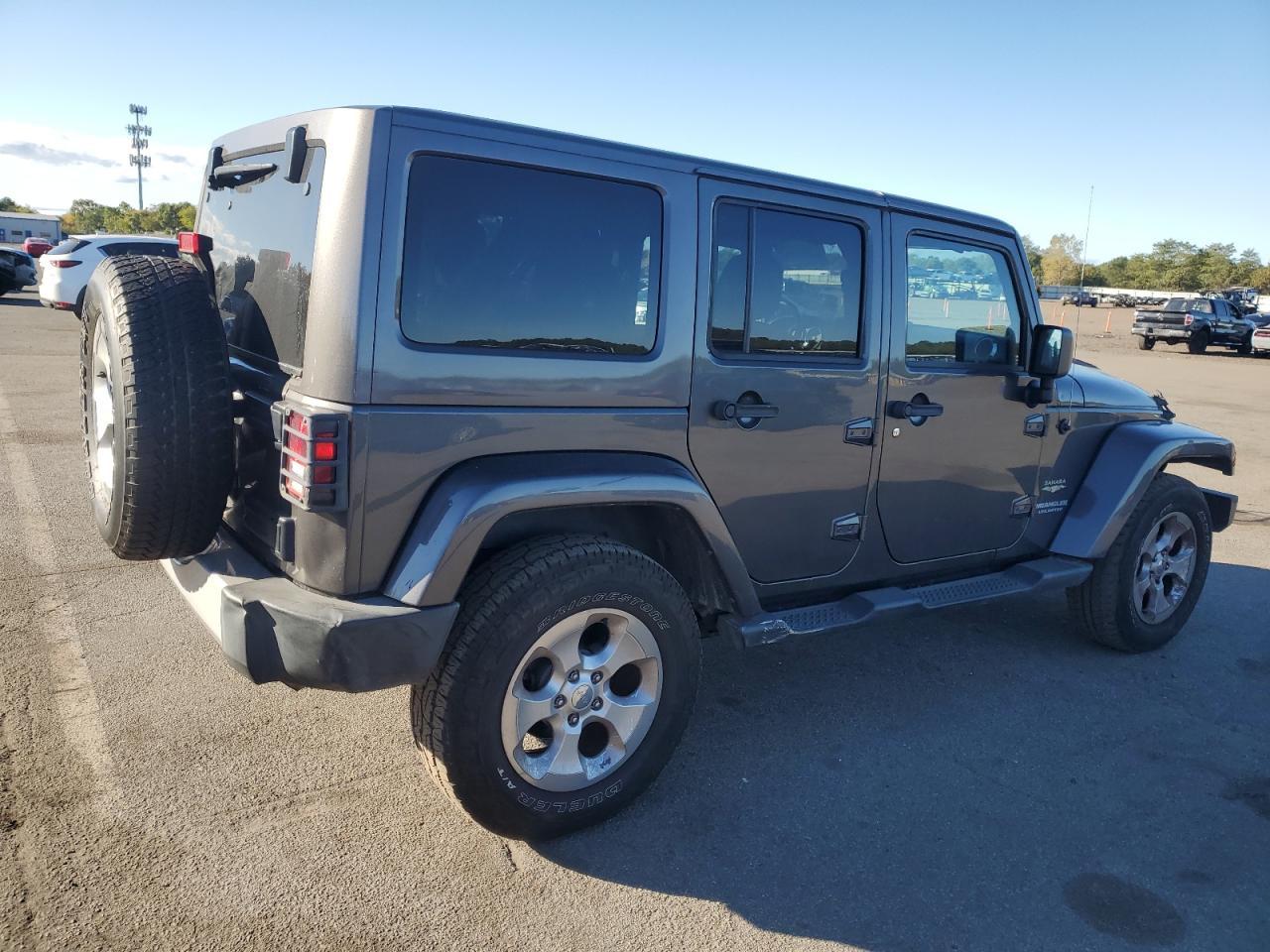 2014 Jeep Wrangler Unlimited Sahara - Фото 3
