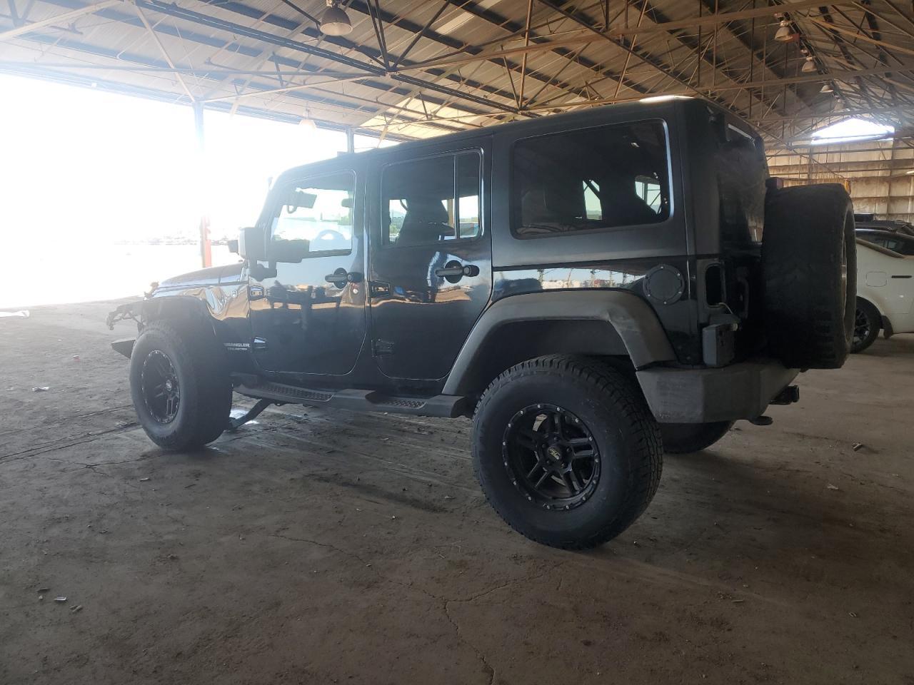 2012 Jeep Wrangler Unlimited Rubicon - Фото 2