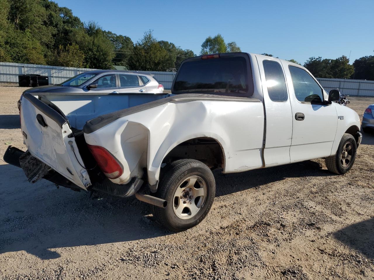 2003 Ford F150 - Фото 3