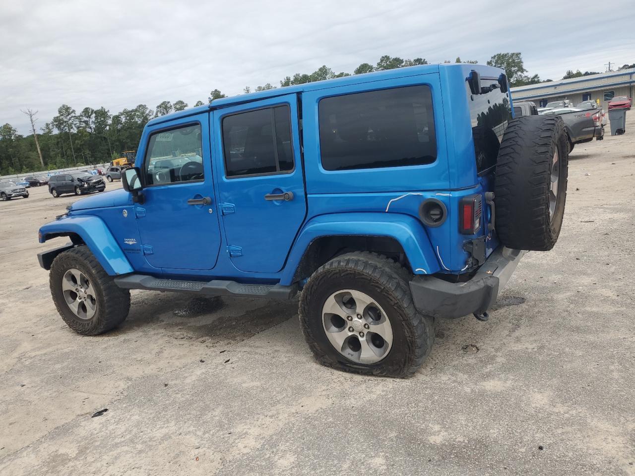 2015 Jeep Wrangler Unlimited Sahara - Фото 2