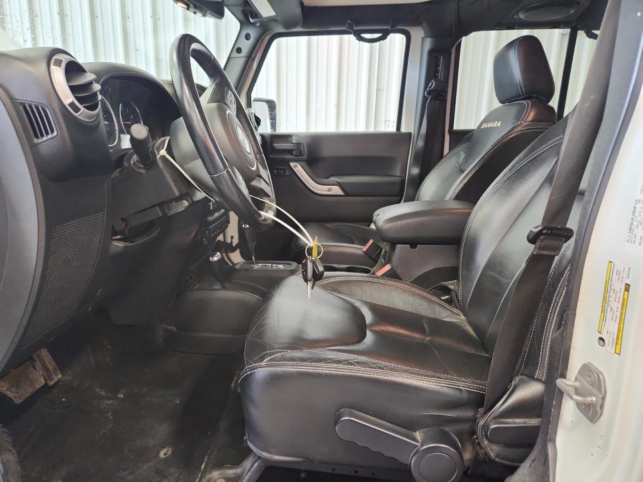 2013 Jeep Wrangler Unlimited Sahara - Фото 7