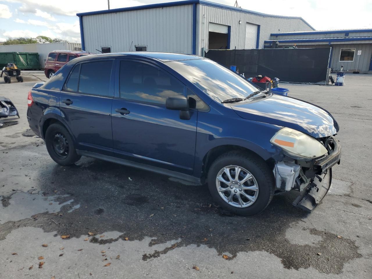 2009 Nissan Versa S - Фото 4