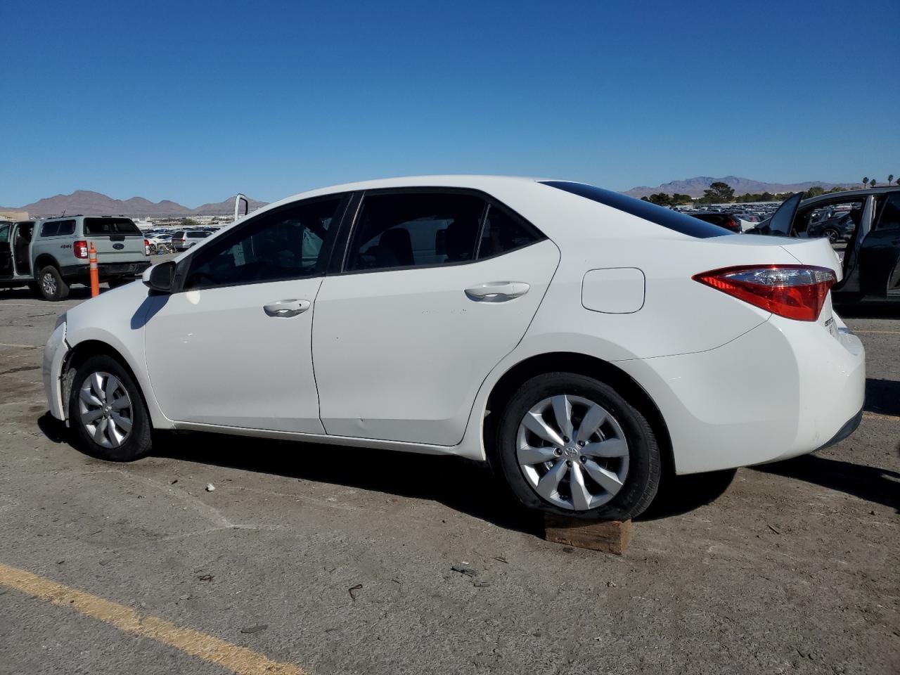 2014 Toyota Corolla L - Фото 2