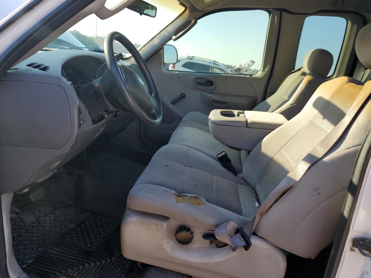 2003 Ford F150 - Фото 7