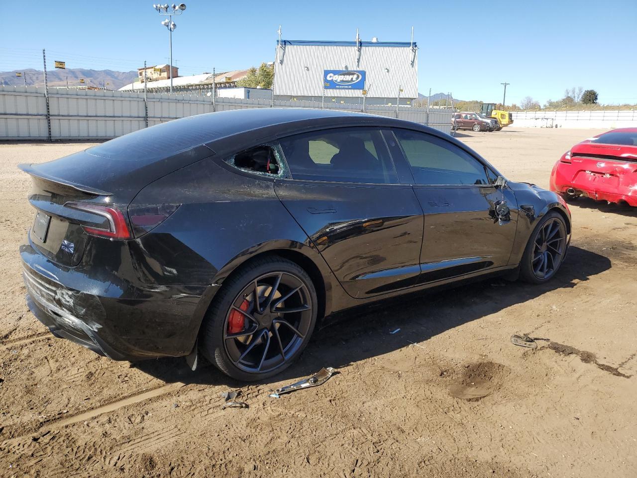 2025 Tesla Model 3 - Фото 3