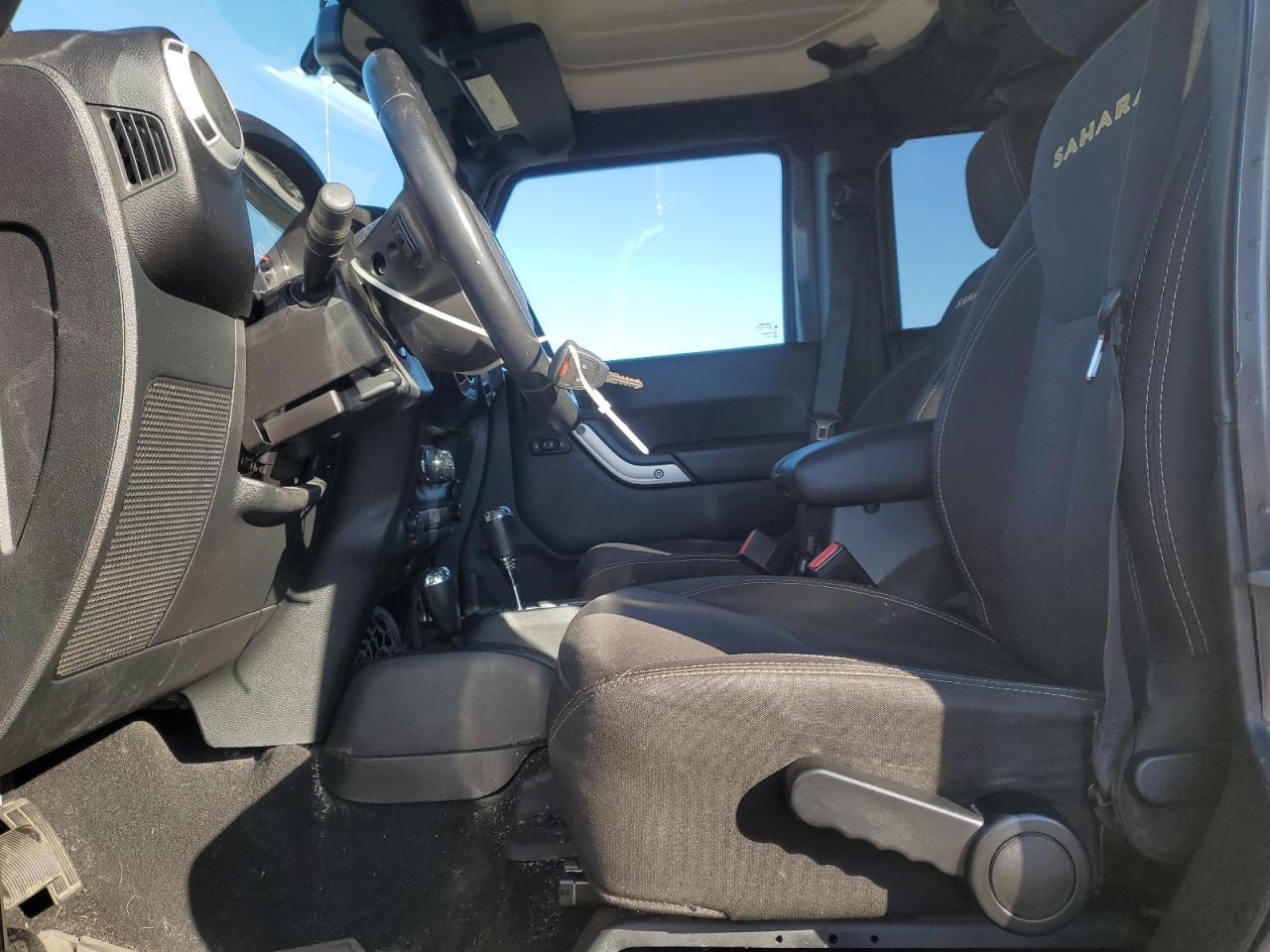 2014 Jeep Wrangler Unlimited Sahara - Фото 7