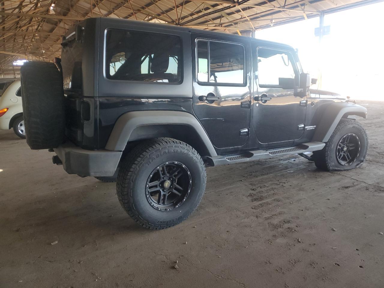2012 Jeep Wrangler Unlimited Rubicon - Фото 3