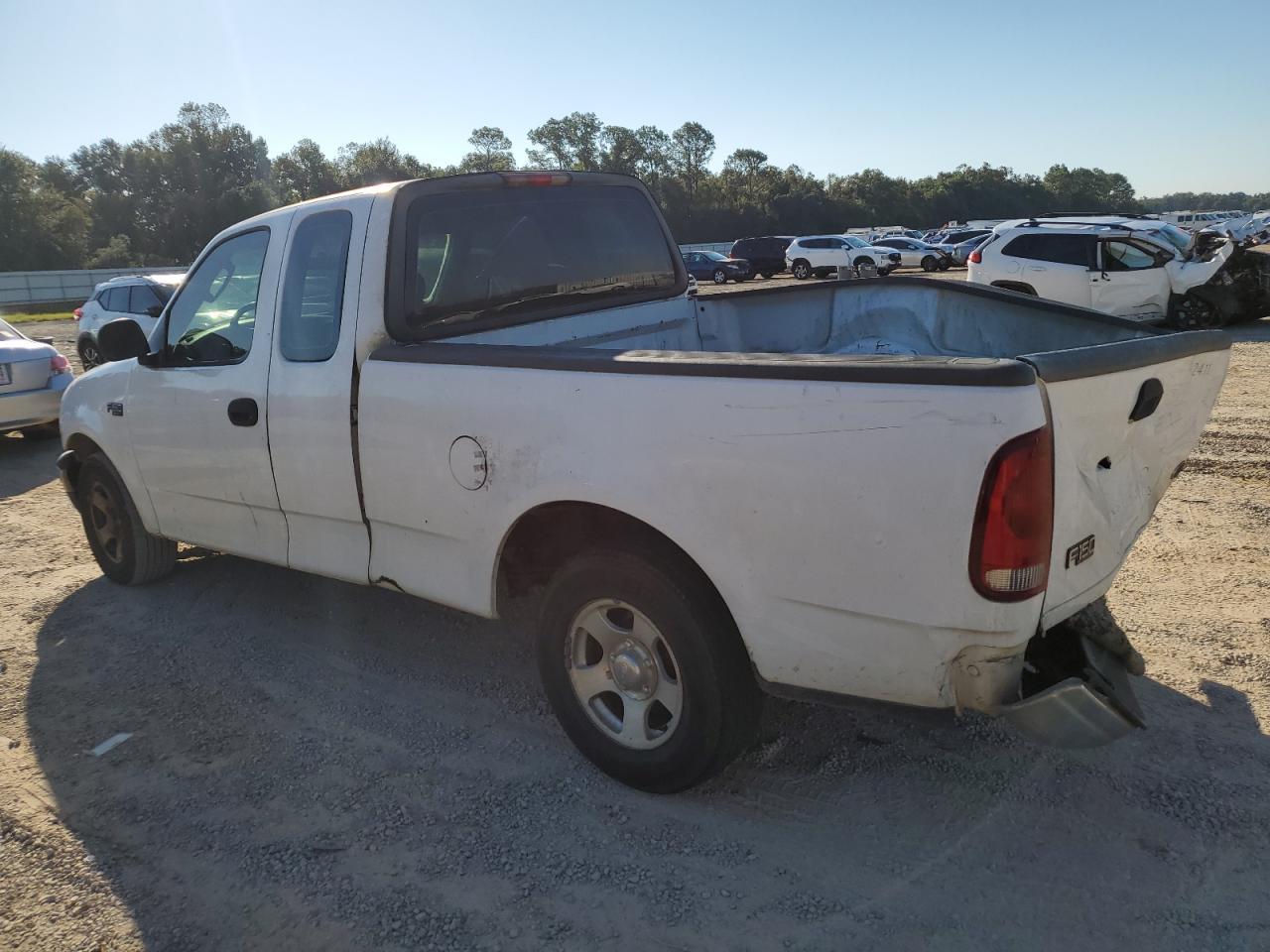 2003 Ford F150 - Фото 2