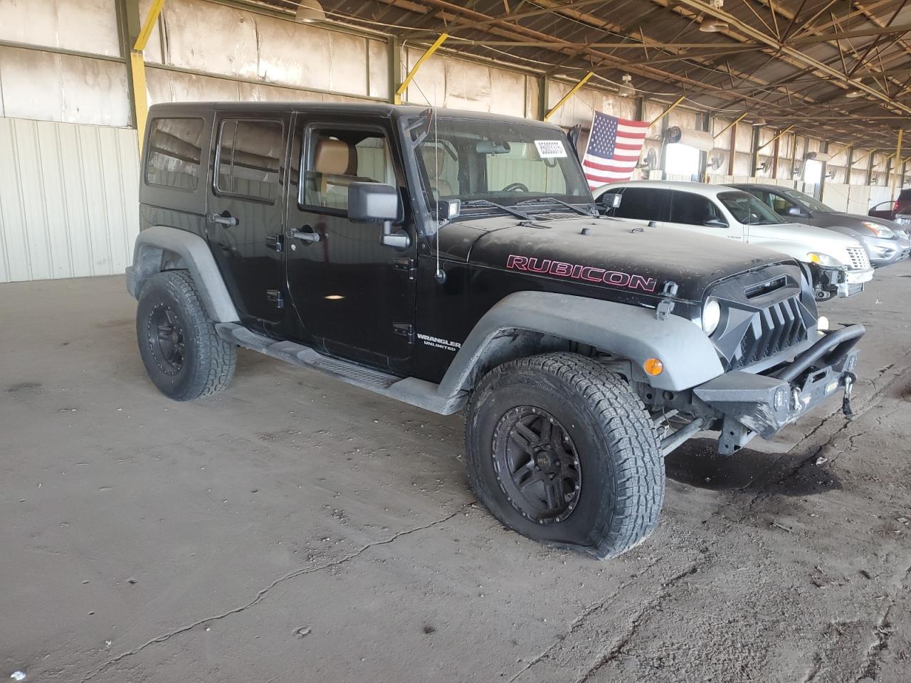 2012 Jeep Wrangler Unlimited Rubicon - Фото 4