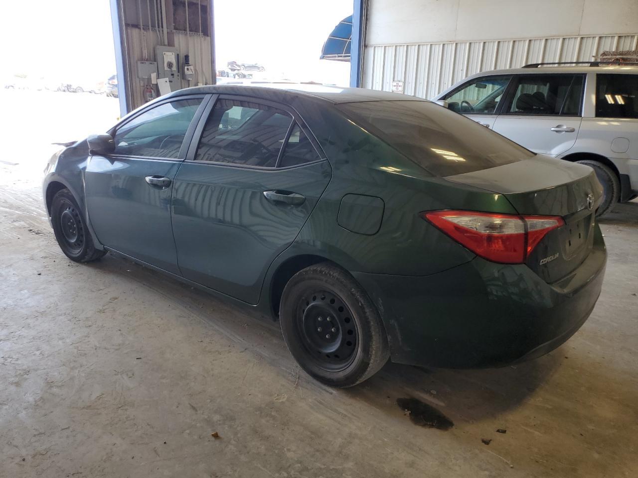 2014 Toyota Corolla L - Фото 2
