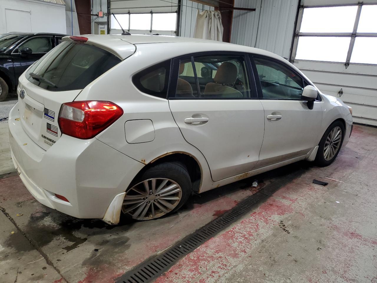 2014 Subaru Impreza Premium - Фото 3